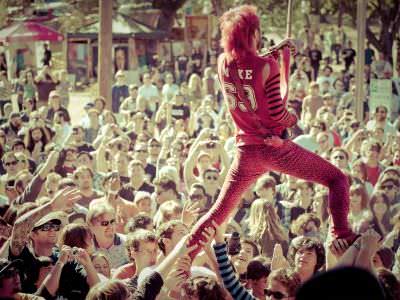 a concert singer wearing red